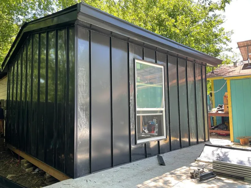 Black standing seam metal wall panels for Roof Inspection in Fort Polk South
