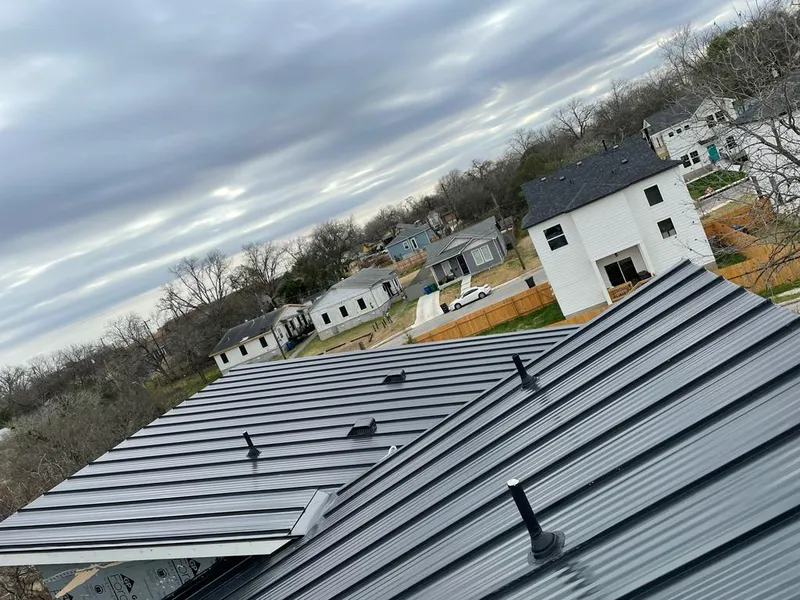 Standing seam metal roof panels with vents for Skylight Repair in Fort Polk South